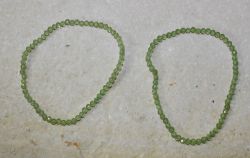 Peridot - Kugel - facettiert - 3mm - Armband Elastik - 2 St.