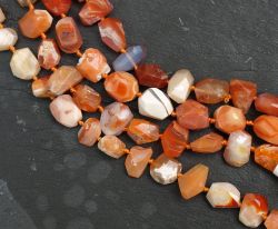 Feueropal - Freeform - facettiert - 8-16mm - Kettenstrang