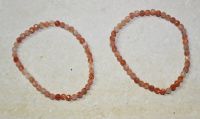 Sonnenstein - Kugel - facettiert - 4mm - Armband Elastik - 2 St.