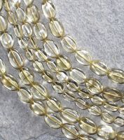 Brasilianit - Oval - 6-8mm - Kettenstrang